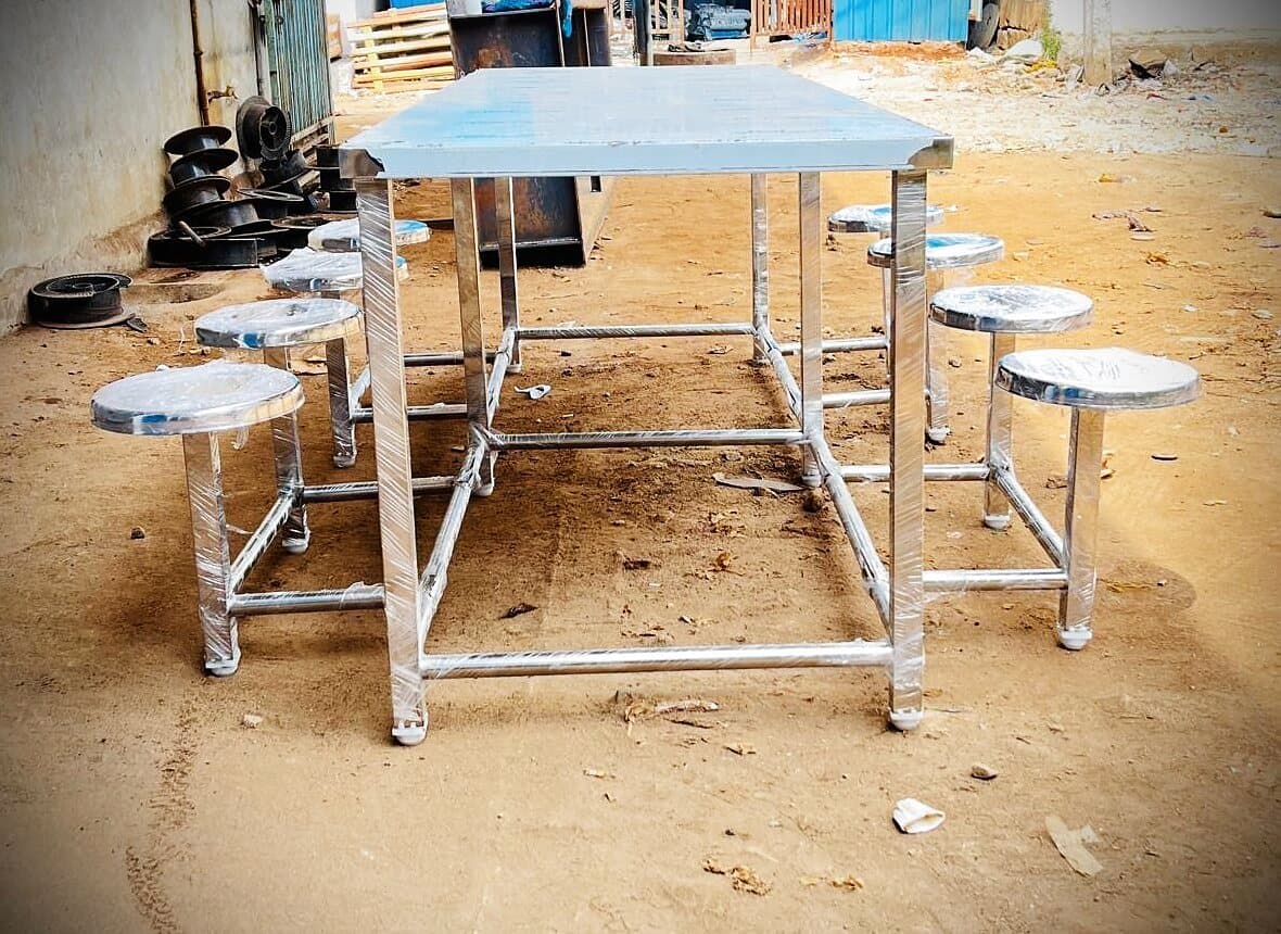 8 seater stainless steel canteen dining table with attached round stools