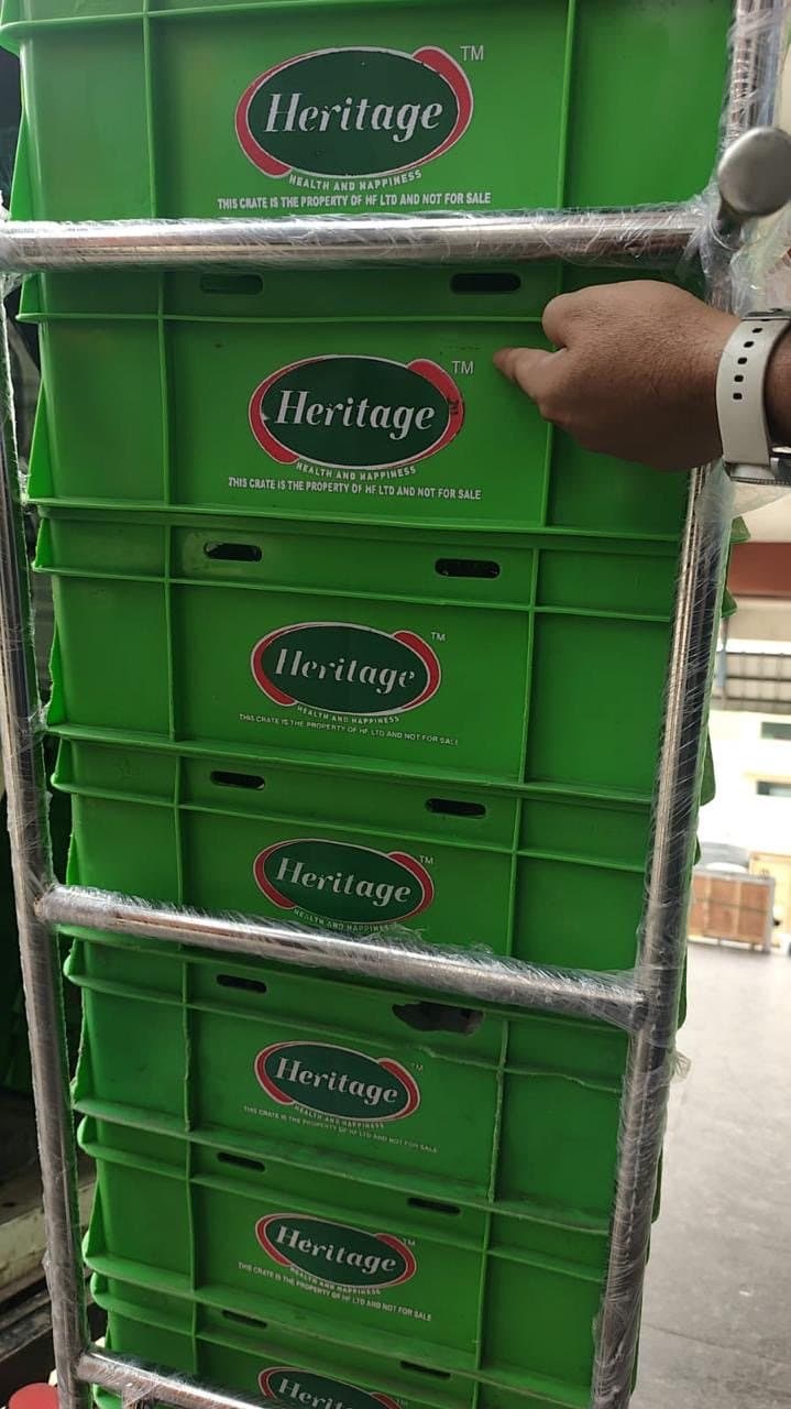 Stainless steel crate trolley loaded with Heritage milk crates