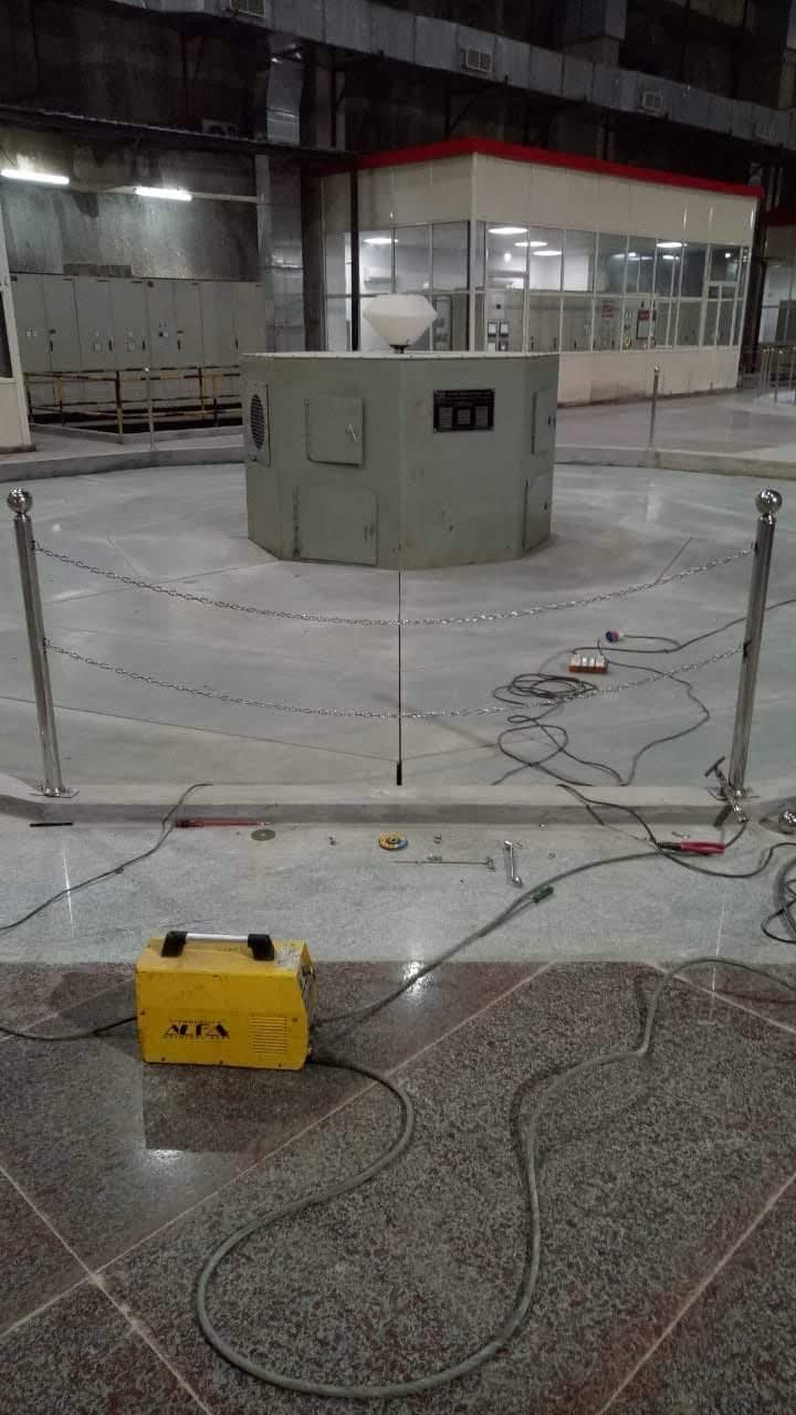 Chain railing being installed with a welding set on site