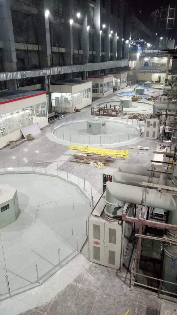 Overhead view of the pump house floor with railings around the units